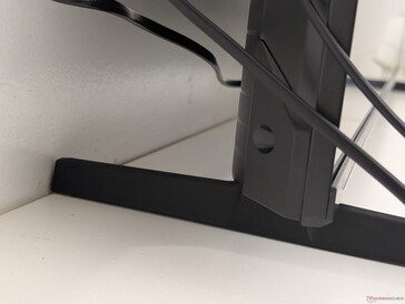 Due to the elongated feet, the back of the TV will always sit a few inches away from the wall