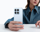 The Xiaomi 18 may feature a 6.4-inch display. Pictured: a promo picture showing the Xiaomi 17 being held by a woman.