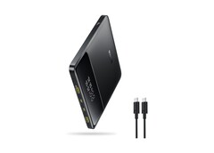 The image shows a photo of the Basis Blade 100 Watt Power Bank, which features an ultra-slim design.