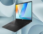 The Asus Vivobook S 14 OLED has an RGB backlit keyboard. (Image source: Asus/Best Buy, Unsplash, edited)