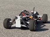 3D-printed RC chassis on asphalt