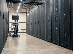 Aisle between server racks in a data center