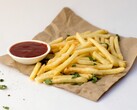 A serving of French fries and a bowl of sauce (Image source: Pixzolo Photography via Unsplash; cropped)