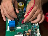 Technician testing electronic hardware, similar to the process used for PQShield's post-quantum cryptography chip (Image source: Pexels)