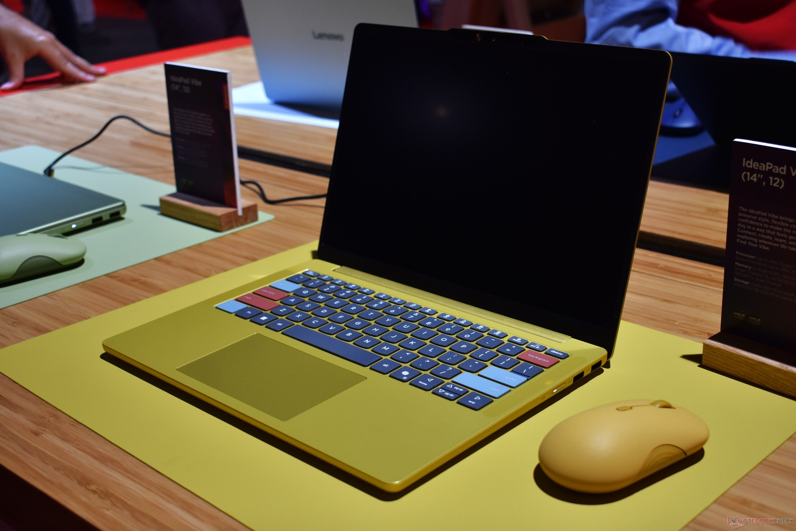 The Lenovo IdeaPad Vibe 14 in "Spicy Gold" with customized keycaps.