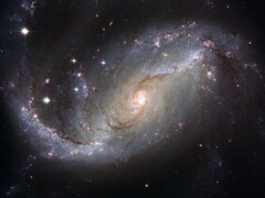 An image showing the galaxy NGC 1672 and stars in the universe. (Image source: WikiImages - Pixabay)