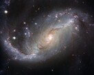 An image showing the galaxy NGC 1672 and stars in the universe. (Image source: WikiImages - Pixabay)