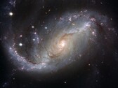 An image showing the galaxy NGC 1672 and stars in the universe. (Image source: WikiImages - Pixabay)