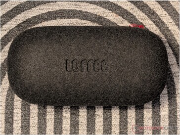 Pill shaped hard case with textured finish.
