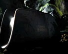 The darkened image shows the charging dock for the 8BitDo Pro 3 Tomb Raider edition.
