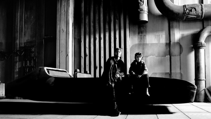 Ryan Gosling on the left and Flynn Gray on the right on a landspeeder. (Image source: Ed Miller)