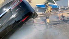 Sacramento firefighter putting out a Tesla (image: SFD)