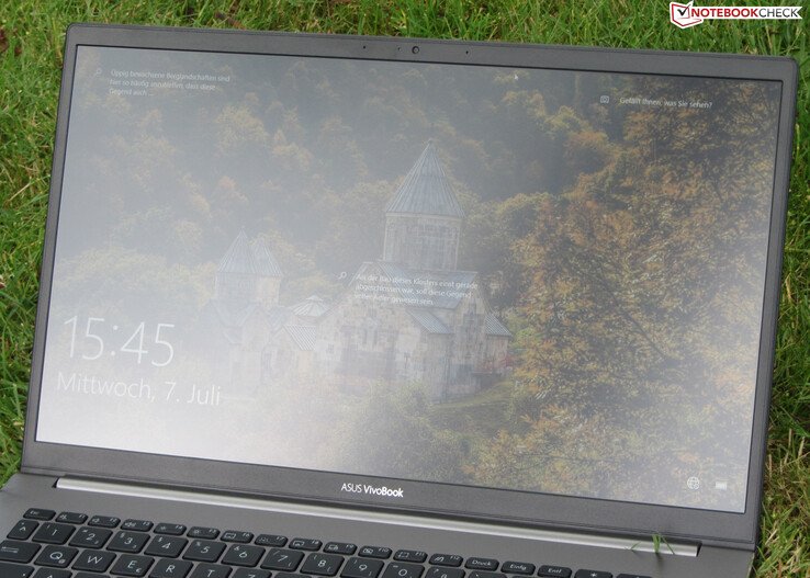 The Vivobook outdoors.