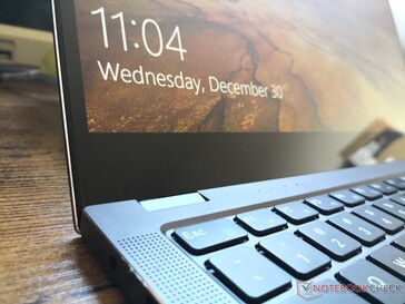 Edge-to-edge glass. However, the display is not a touchscreen