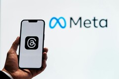 Meta, logo of which is pictured in the background, has started an acquisition spree of AI startups. (Image Source: Julio Lopez - Pexels)