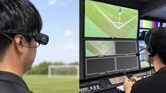 Xacti CX-WL100 wearable camera being fitted for referee-camera use during a football broadcast.