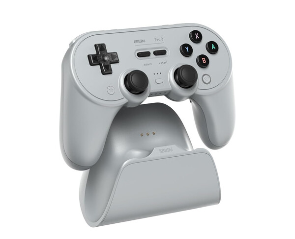 The 8BitDo Pro 3 comes with a charging dock that houses the 2.4GHz adapter. (Image source: 8BitDo)