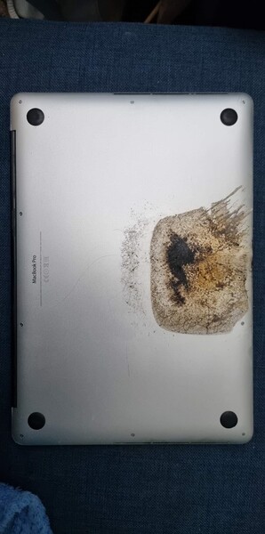 Fire-damaged 15-inch MacBook Pro. (Image source: U/Squeezieful)