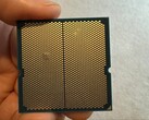 A user has shared images of a bulge in their Ryzen 9 9950X3D CPU which was paired with an ASRock motherboard. (Image source: I_fliu on Reddit)