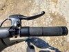 SoFlow uses a twist grip to operate the motor.
