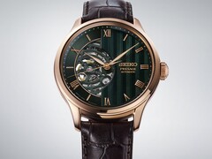 Close-up of the Seiko Presage HCB007’s green dial, showing its textured geometric pattern, Roman numeral markers, and exposed mechanical movement.