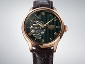 Close-up of the Seiko Presage HCB007’s green dial, showing its textured geometric pattern, Roman numeral markers, and exposed mechanical movement.