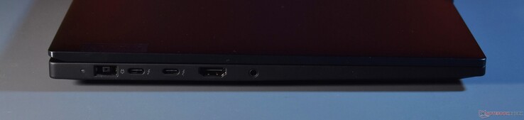 left: Slim tip charger, 2x Thunderbolt 4, HDMI, 3.5mm Audio