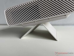 The stand allows for flexible positioning of the projector.