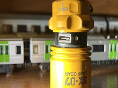 The EDC flashlight's USB port can be covered for protection