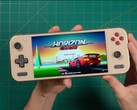 Russ from Retro Game Corps holds the Ayaneo Pocket S2, displaying the title screen of Horizon Chase and showcasing the device’s display and ergonomic design. (Image source: Retro Game Corps)