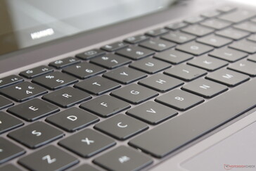 Shallow key travel and feel are reminiscent of the MacBook Air. Two-level white backlight comes standard