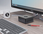 The Nano Pro Gen 14 starts at €840. Pictured: the mini PC next to a monitor, keyboard, teacup, pen. (Image source: Tuxedo)