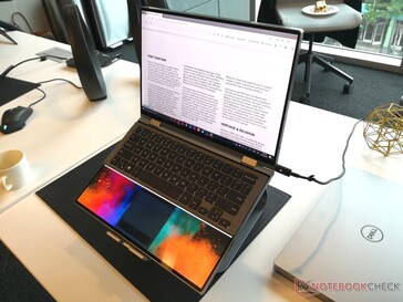The detachable keyboard is roughly half the height of one screen. When positioned on the upper half of one screen, the bottom portion of the screen automatically turns into a virtual touchpad
