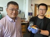 Hailong Chen and Zhantao Liu present a new, low-cost cathode for all-solid-state lithium-ion batteries. (Image source: Jerry Grillo / Nature Sustainability / Georgia Institute of Technology)