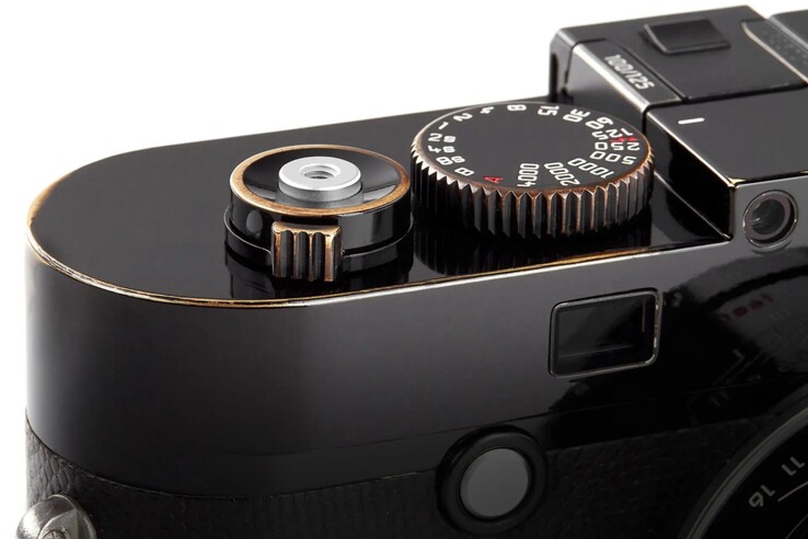 When the black gloss wears off, the brass underneath is revealed.