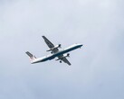 An airplane flying in the sky (Image source: Kat von Wood via Unsplash; cropped)