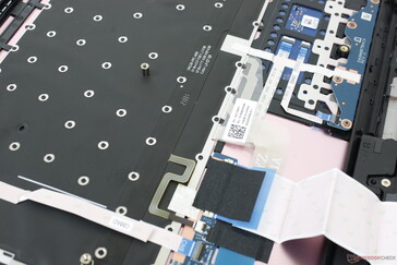 Ribbon cable connects the keyboard deck to the motherboard