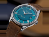 KUOE Royal Smith automatic watch with turquoise-blue dial, silver Roman numerals and brown leather strap.
