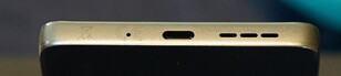 Bottom: Microphone, USB-C port, speakers