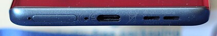 Bottom: SIM slot, microphone, USB-C port, speaker