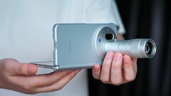 The Vivo X Fold 6, pictured here with its Zeiss teleconverter, will be available in four color options. It underwent durability testing in a new promo video.