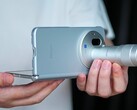 The Vivo X Fold 6, pictured here with its Zeiss teleconverter, will be available in four color options. It underwent durability testing in a new promo video.