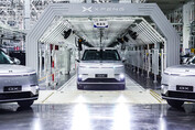First mass-produced Xpeng GX robotaxi rolls off the production line