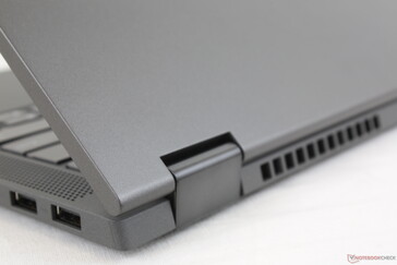 Outer lid appears to be smooth aluminum in contrast to the plastic base