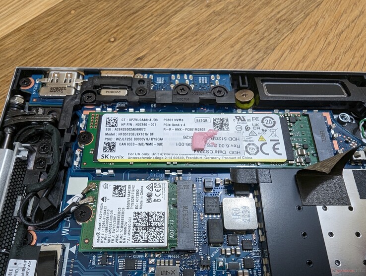 Aluminum cover removed to reveal the primary SSD
