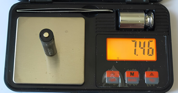 One of the 2 batteries ordered puts a mere 7.46 g (0.26 oz) on the scales. Image upscaled with iloveimg.com