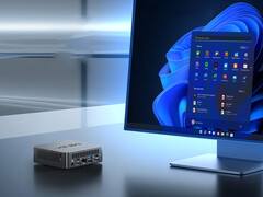 The NUC150 can be equipped with either the Intel N150 or the Core 3 N355. Pictured: a promo image of the mini PC sitting next to a monitor. (Image source: Minix)