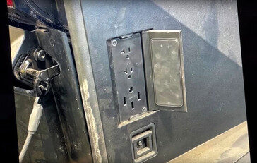 Tesla appears to be loading the Cybertruck's bed with power outlets, including two standard 110 V units alongside a NEMA 14-50 outlet for 220 V needs. (Image source: TFLEV on YouTube)