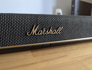 Woven fibre, brass accents, and leather texture