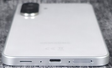 Right case side (speaker, microphone, USB port, microphone, card slot)